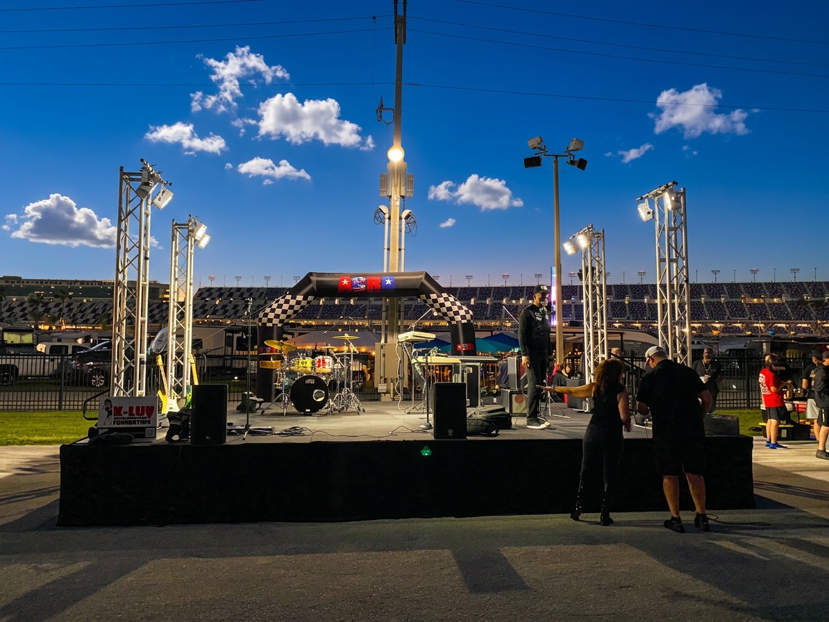 wide-angle outdoor festival main stage setup with truss lighting and full band configuration at a Central Florida venue