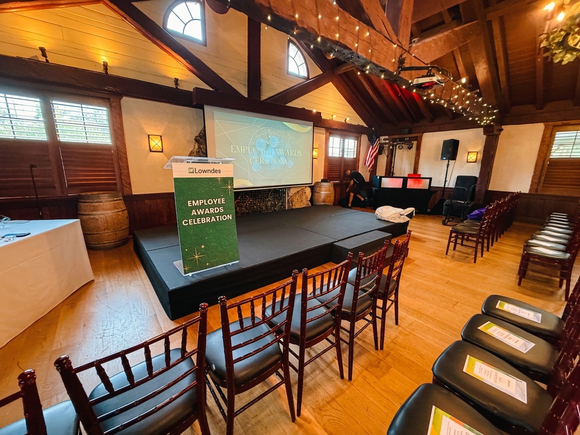 branded corporate podium with company logo on a speaking stage