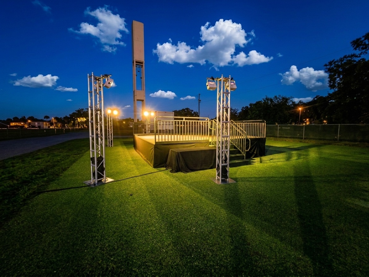 warehouse shelving with stacked stage lighting fixtures and cable spools, Winter Park