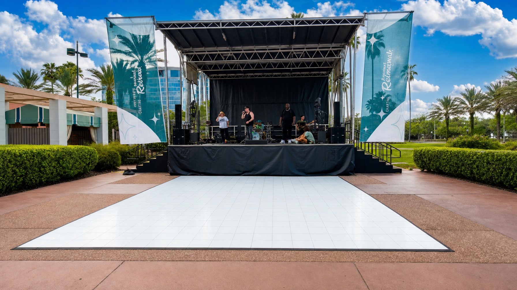 outdoor festival stage with shade cover and misting fans set up along the front deck
